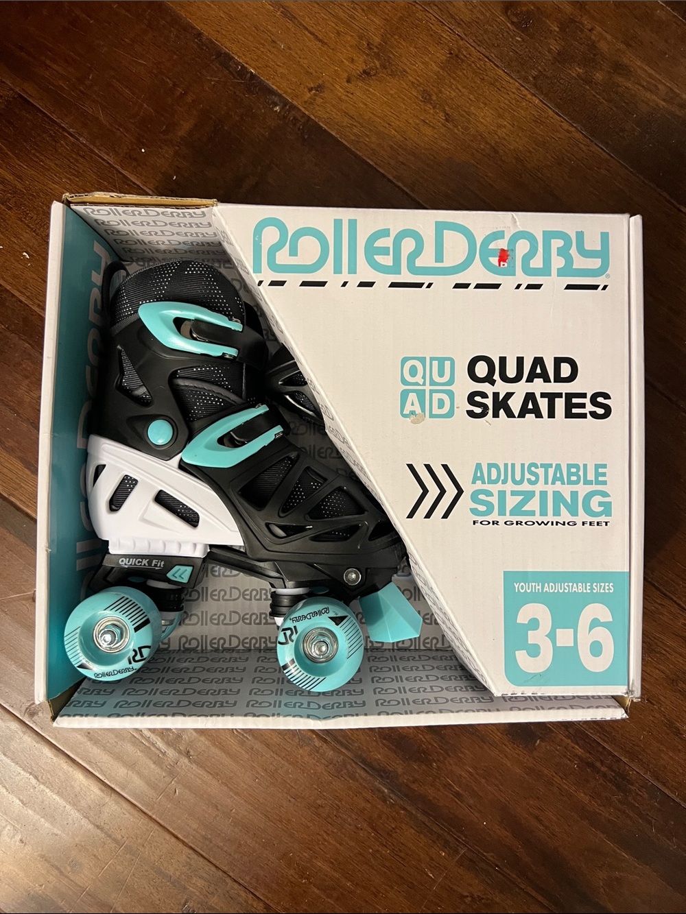 Roller Derby Youth Adjustable Quad Skates - Black & Teal (Sizes 3-6)